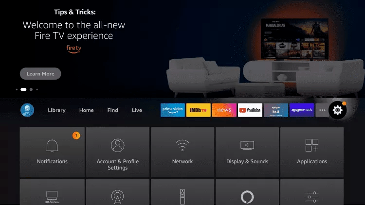 Fire TV home screen with the settings and search row highlighted